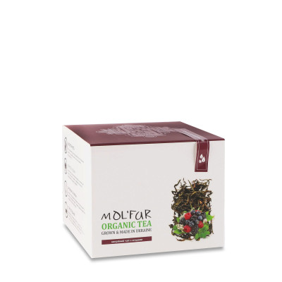 Black Cypriot tea (Ivan tea) with raspberries, blueberries, lingonberries, organic